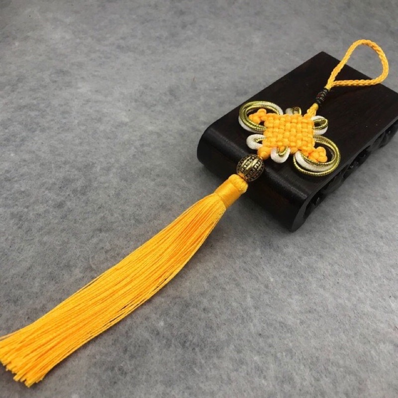 Tua rua, dây đồng tâm trang trí áo dài, mũ nón, túi sách