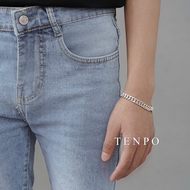 Quần jean nam TENPO kiểu dáng slimfit vải denim | Quần xanh trơn cắt gấu