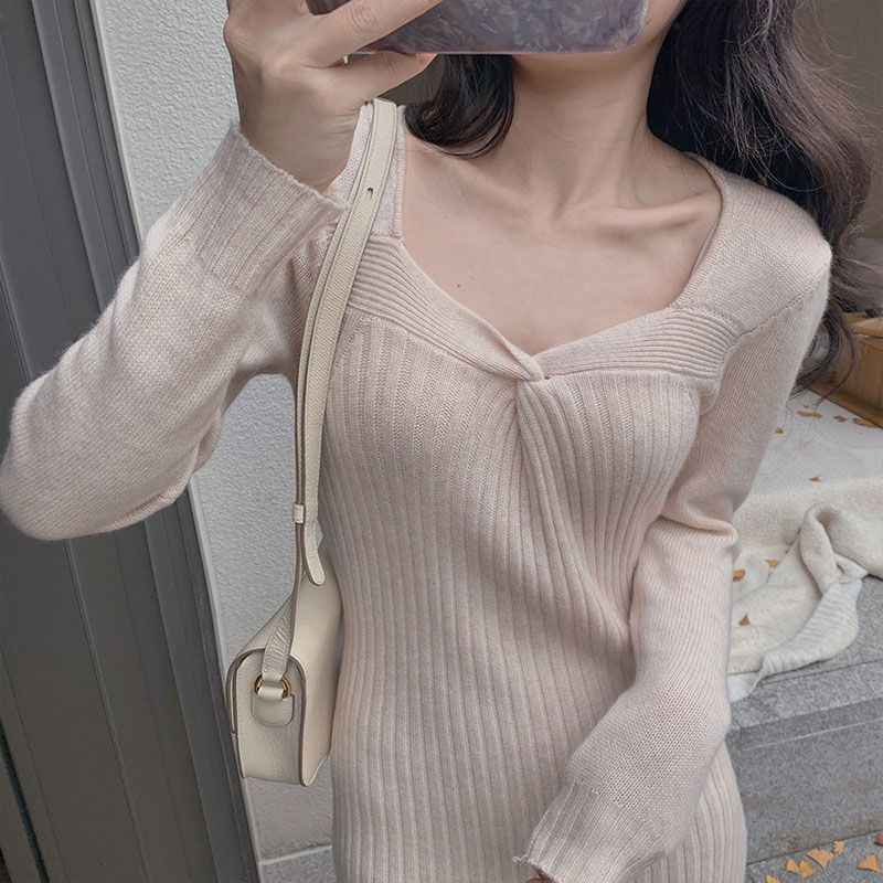 Váy len midi màu kem cổ xoắn ôm dáng nhẹ