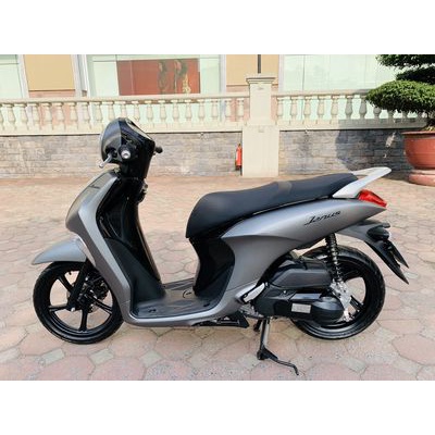 Nhôm gác chân xếp sau Janus có gác xếp Trái