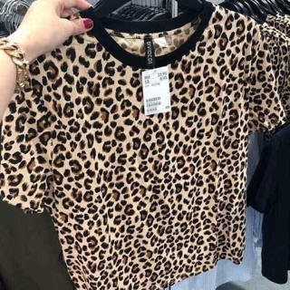 Áo da báo HM