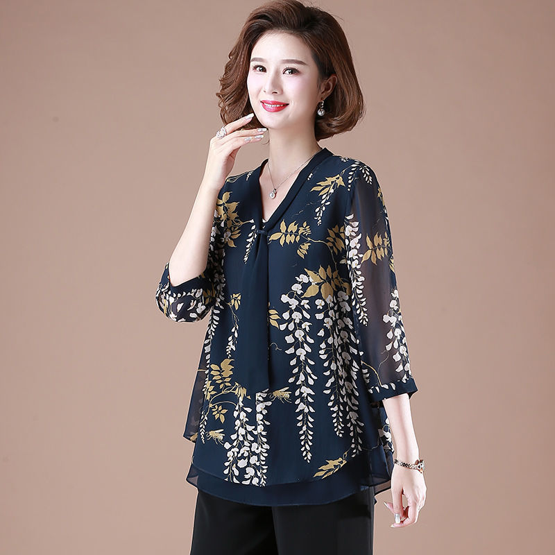 Set áo tay lửng in lá cây kèm quần đen suông cho phụ nữ trung niên | BigBuy360 - bigbuy360.vn