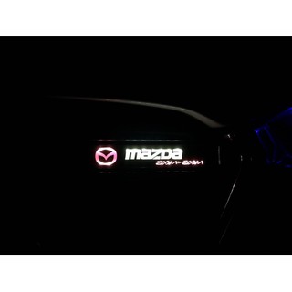 Đèn logo mazda gắn mặt calang