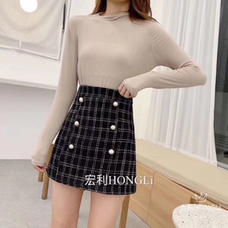 Chân váy dạ chữ a đính khuy ngọc