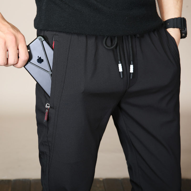 Men's pants thin casual pants sports feet elasticity quick-drying business suits