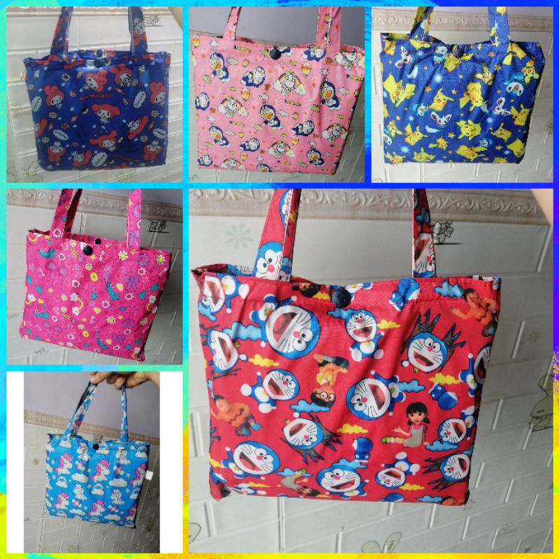 Áo mưa bít vải dù doraemon,picachu,hình thú dễ thương