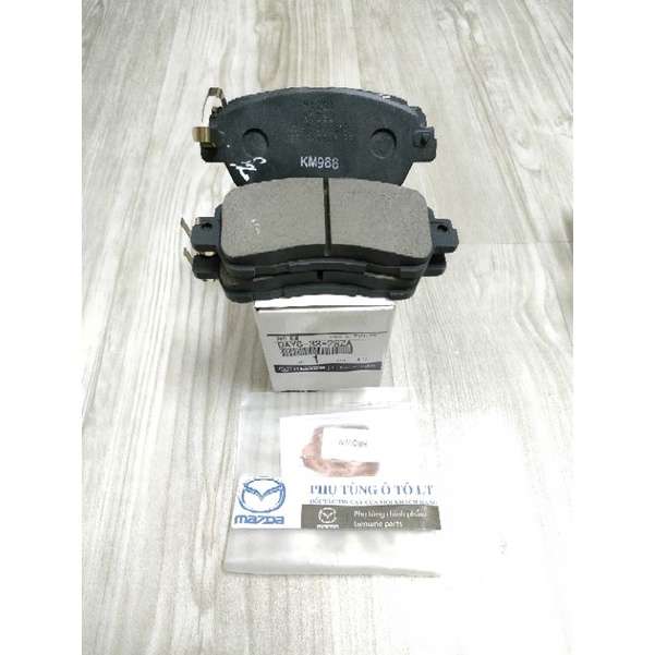 Má phanh trước Mazda 2 2012-2019