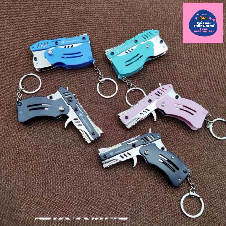 Đồ chơi trẻ em, Móc khóa Hình Súng, Có thể gấp lại, Bắn dây thun, Tặng Sẵn Dây Thun, Nịt quà tặng sinh nhật cho bé