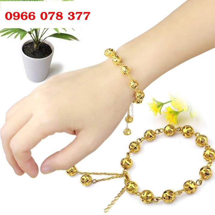 Lắc tay quả cầu vàng