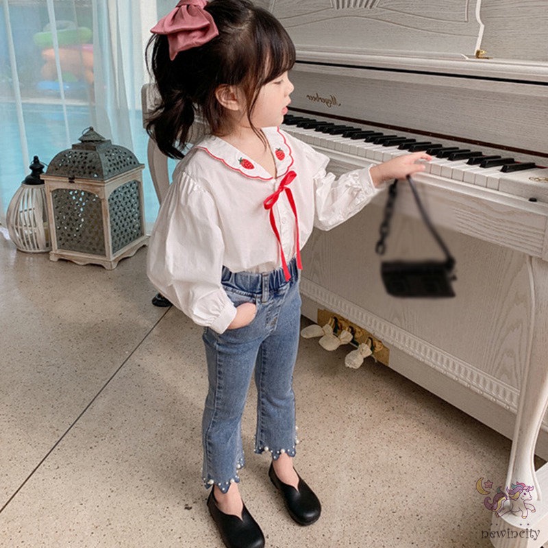 Quần jean lưng vừa đính ngọc trai nhân tạo thời trang Hàn Quốc dành cho bé gái