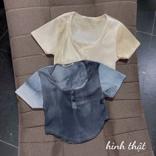 Áo kiểu loang nút bấm vạt bầu