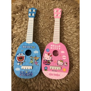 Đàn Guita mini xanh-hồng