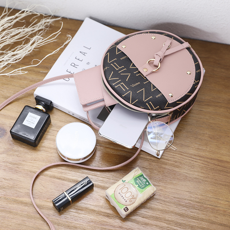 Túi đeo chéo dáng tròn nhỏ sành điệu cho nữ IELGY