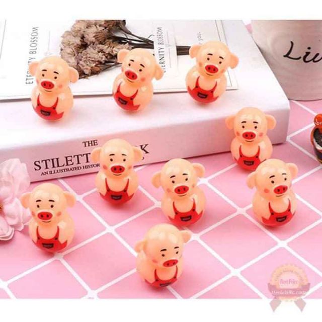 Lật đật hình heo chặn giấy