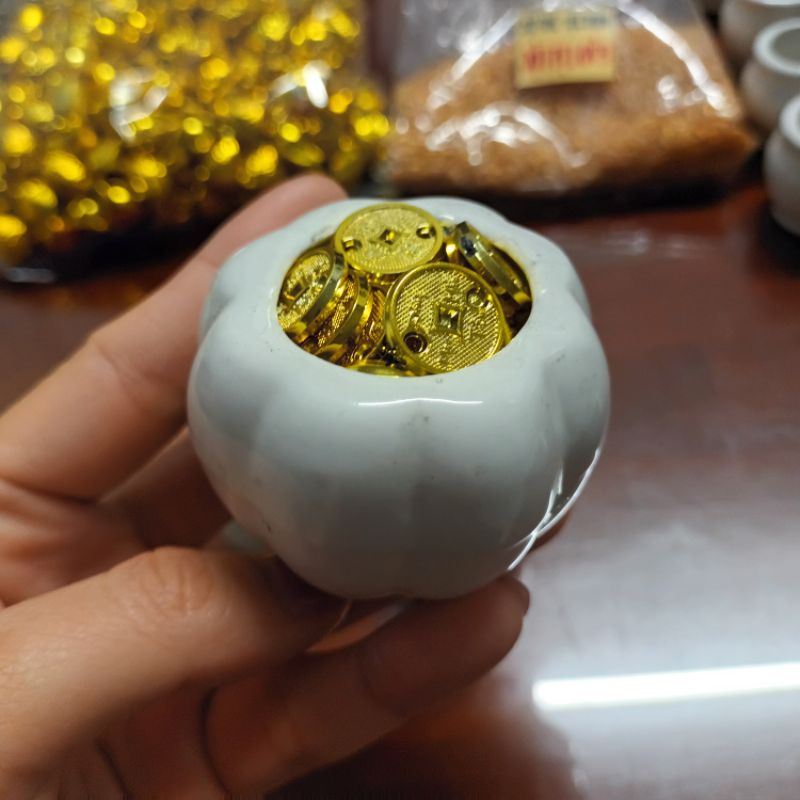 Hủ xu vàng, hủ đồng xu thần tài kích hoạt tài lộc may mắn