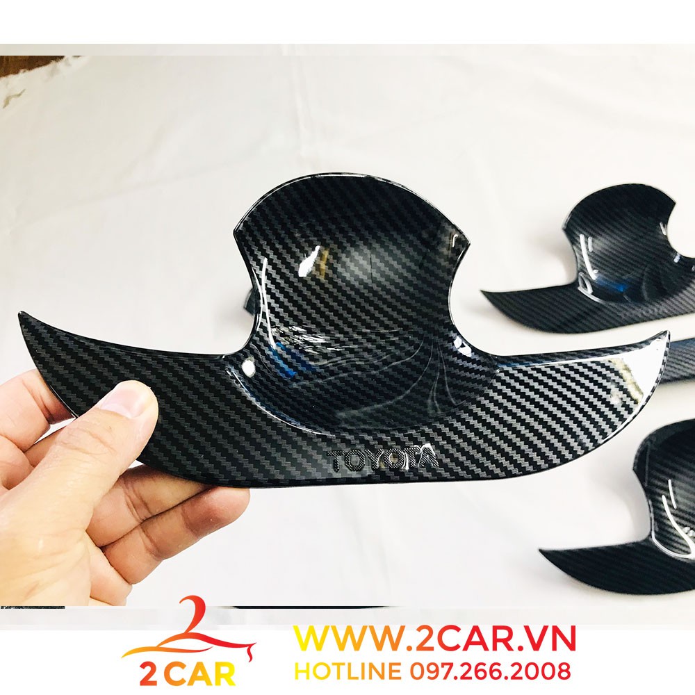 Ốp tay nắm, hõm cửa carbon xe Toyota Corolla Cross 2020-2021 chất liệu Cacbon cao cấp