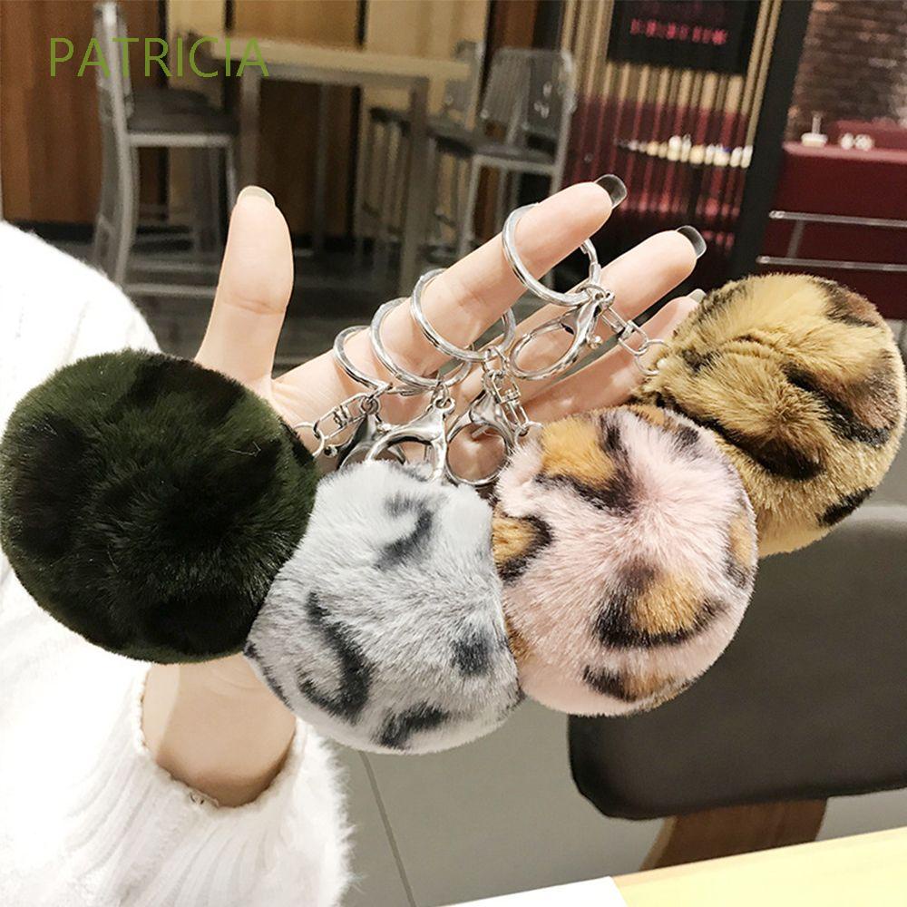 Móc Chìa Khóa Hình Trái Tim Họa Tiết Da Báo Phối Cục Bông Xinh Xắn