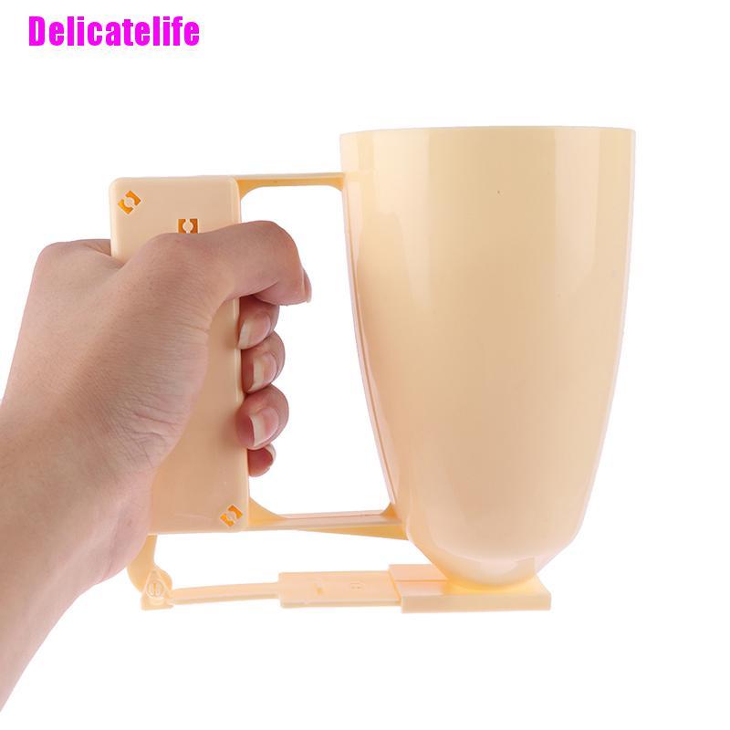 1 phễu rót bột làm bánh cầm tay có thể điều chỉnh