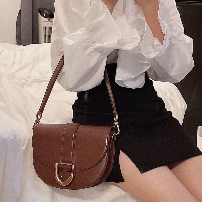 Túi Yên Ngựa CNK Nâu Socola Mới Nhất Gabine Saddle Bag