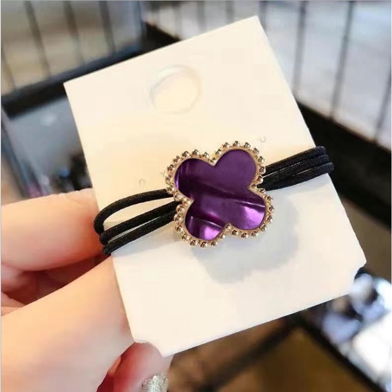 Dây buộc tóc cao su hình cỏ bốn lá đính đá lấp lánh phong cách Hàn Quốc cho nữ