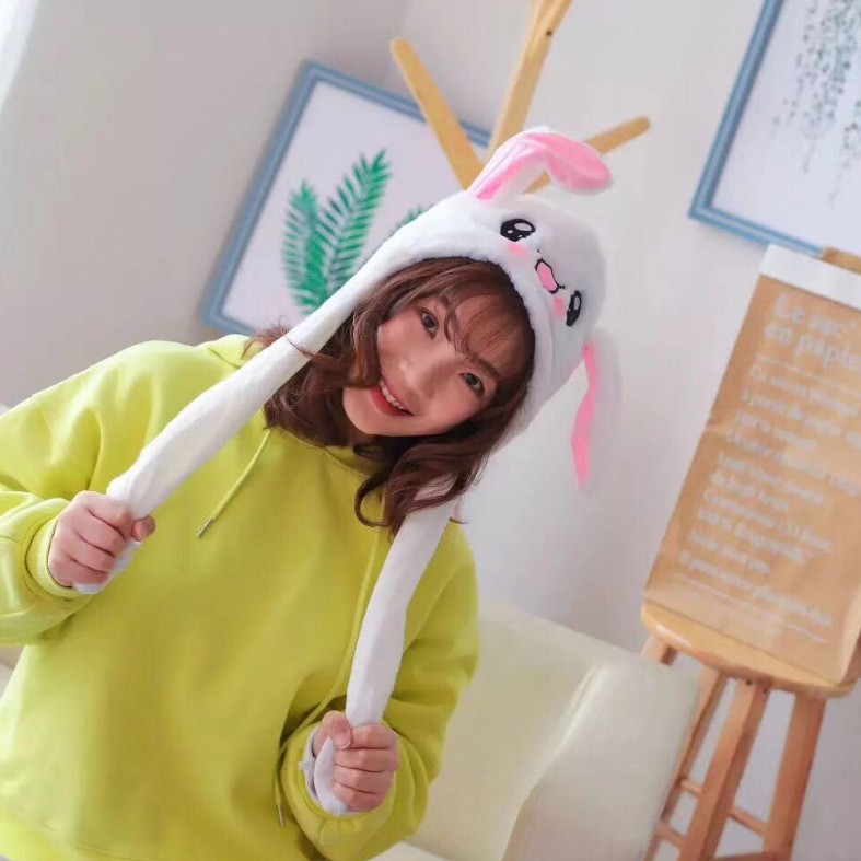 Nón, mũ tai thỏ vẫy hai tai đáng yêu. Bóp hơi giặt tai lên. Đi chơi lạnh, Đà lạt, chụp hình.i