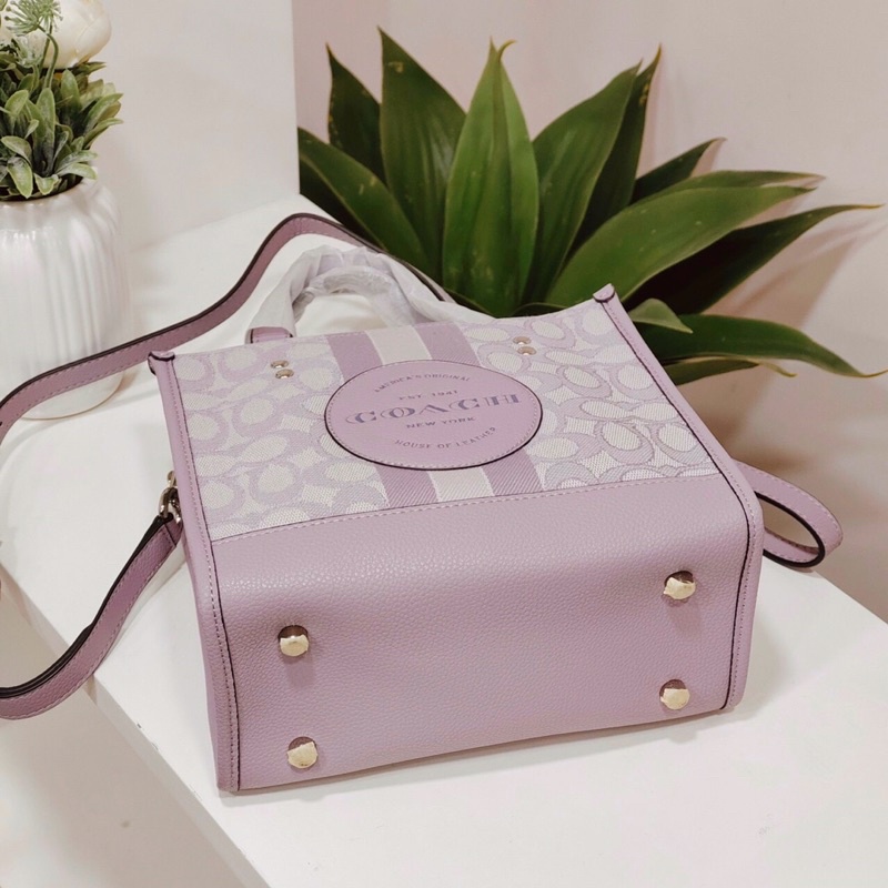 Túi co ach Dempsey tote