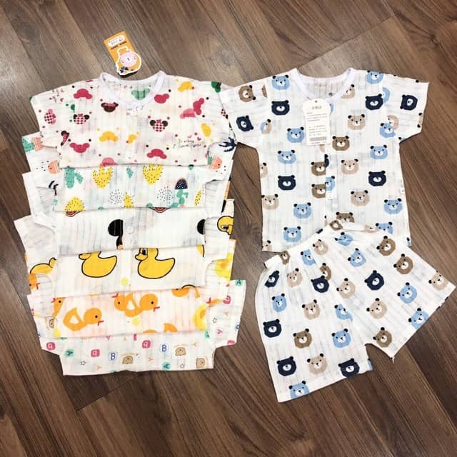 Bộ lửng tay cotton giấy cài cúc giữa mềm mai cho bé trai và gái