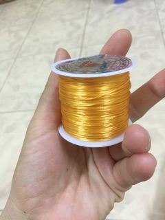 Cuộn cước lụa màu vàng co giãn