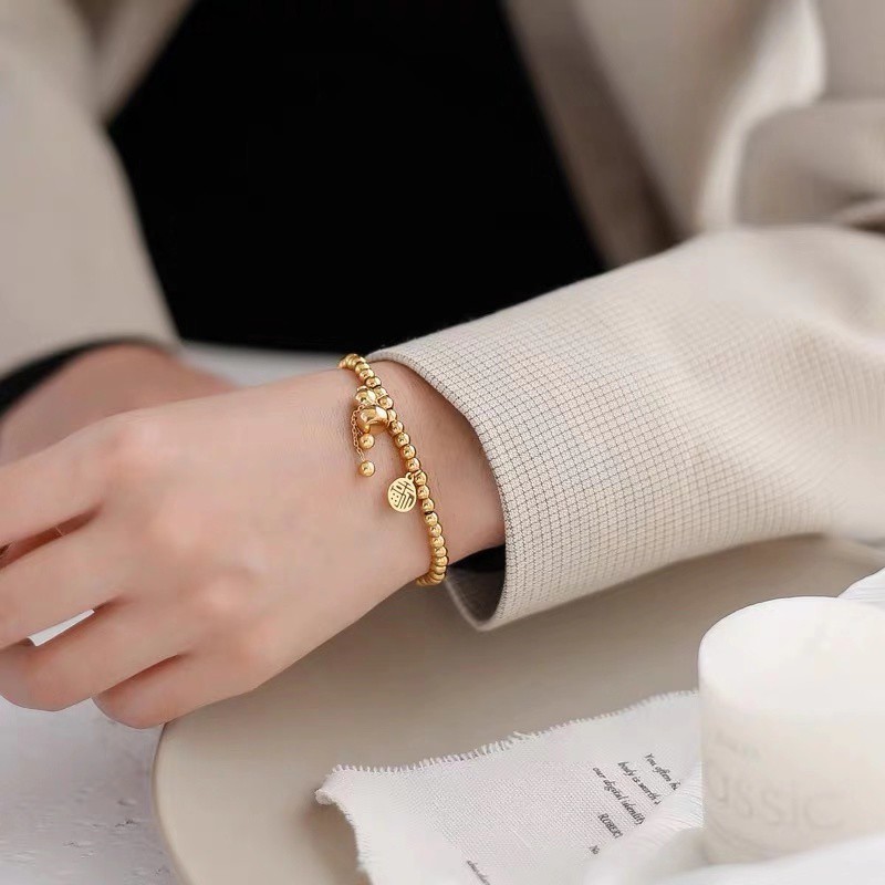 Vòng Đeo Tay May Mắn Bằng Thép Titanium Mạ Vàng Hồng 18K Mặt Hình Quả Bầu Phối Dây Co Giãn