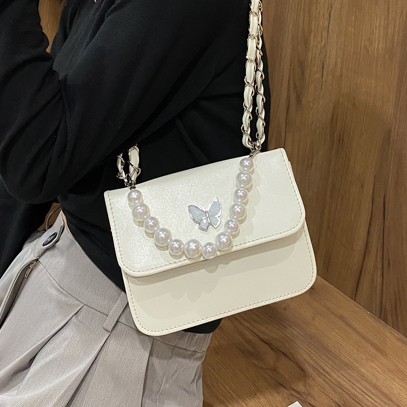 Túi xách nữ đeo chéo trang trí hình bướm dây đeo chuỗi xích kèm chuỗi ngọc trắng thời trang