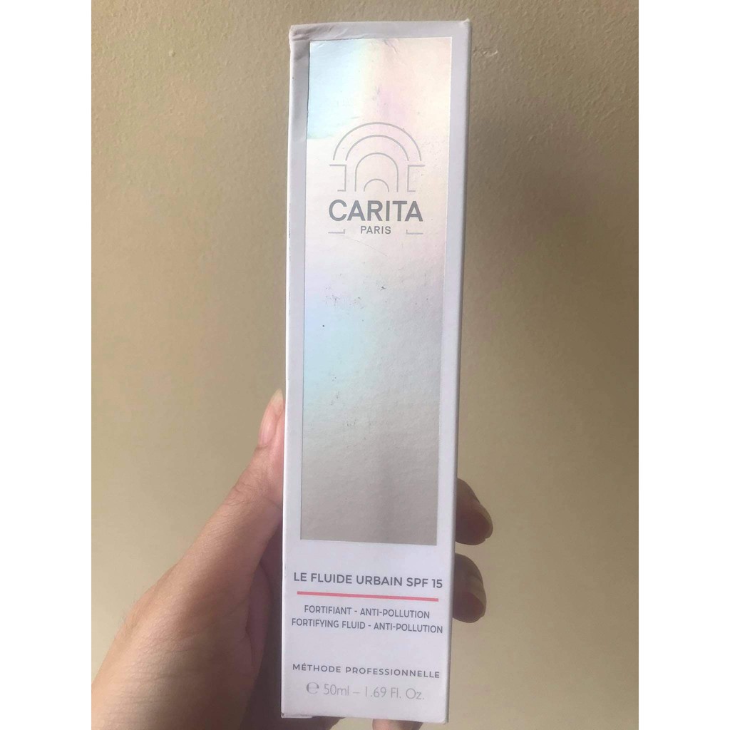 Kem dưỡng dạng lỏng chống ô nhiễm, chống lão hóa CARITA Le Fluide Urbain SPF15 50ml.