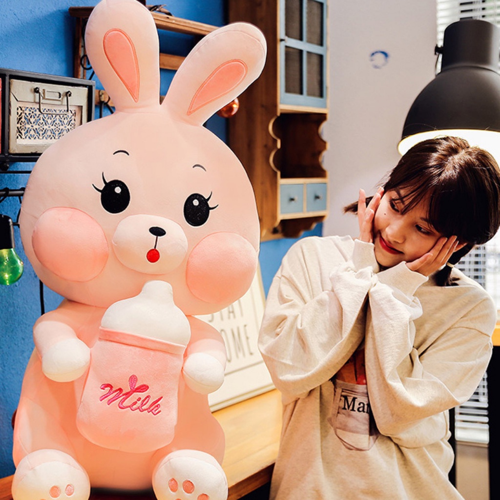 Gấu bông gối ôm thỏ ôm bình sữa thú nhồi bông dễ thương chất liệu mềm mại SHOPBANDON