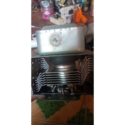 Súng lò vi sóng cũ tháo máy còn đẹp chạy tốt.