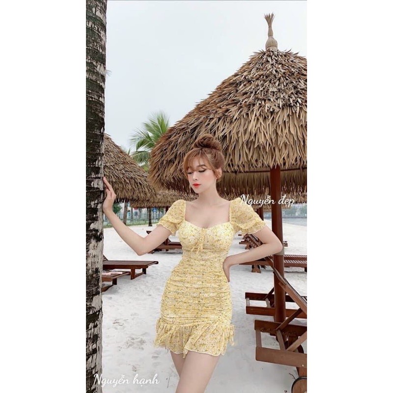 Đầm body hoạ tiết hoa nhí phối dây nơ hai bên, có kèm mút ngực