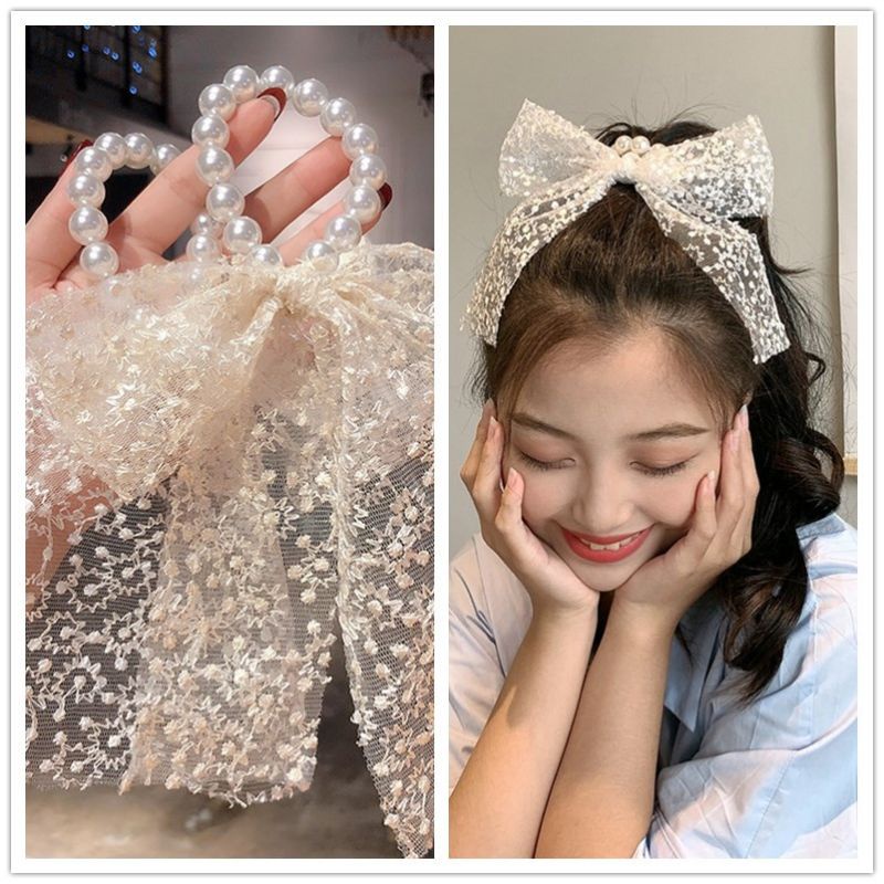 Cột tóc dây ngọctrai phối ren tiểu thư