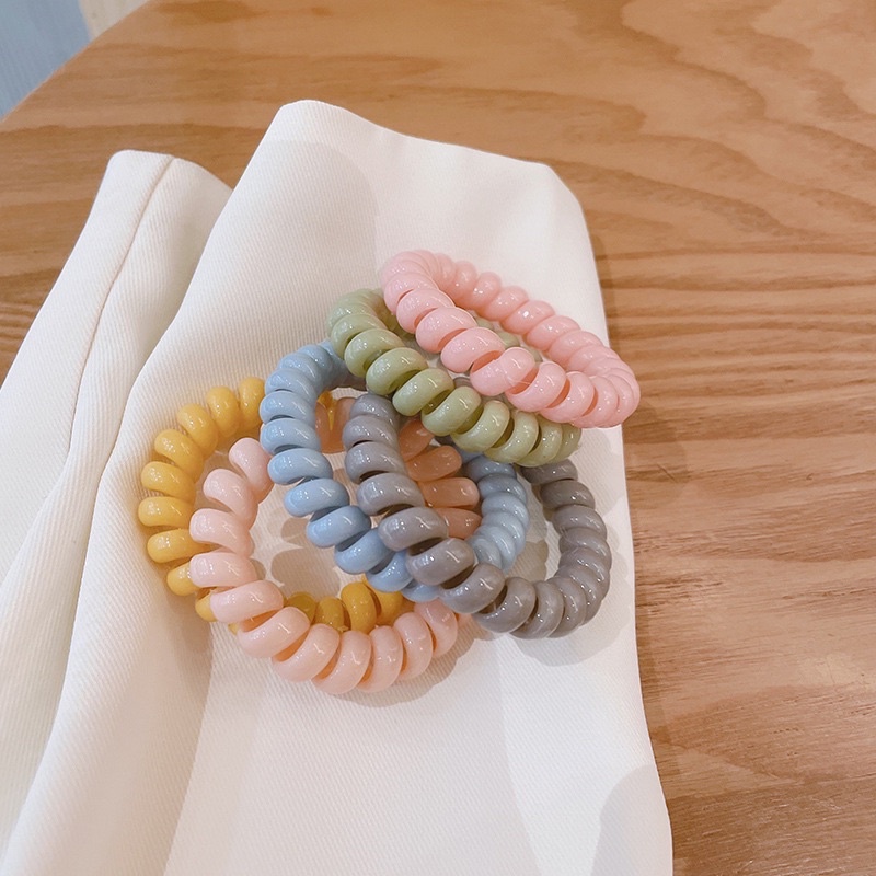 Dây buộc tóc lò xo xoắn nhiều màu pastel
