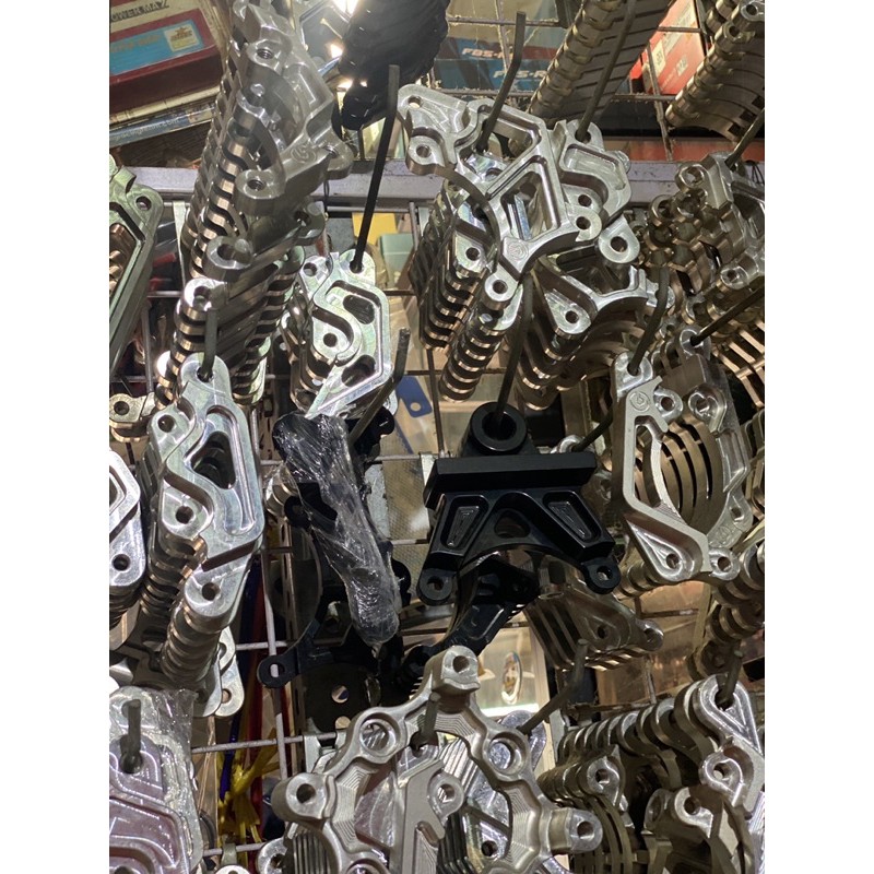 pass nhôm bass cnc heo thắng 2 piston đối xứng