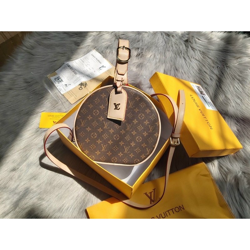 Túi quai xách tròn khoá bấm