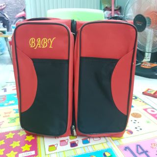 Balô và Nôi vải xách tay.