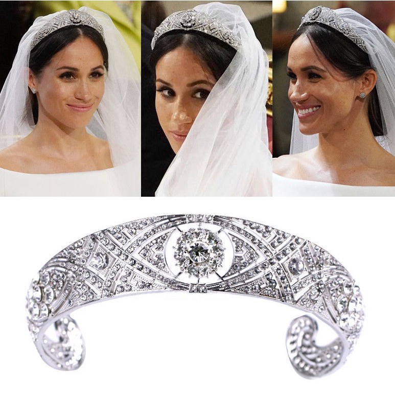 The bride's crown is studded with crystal stones