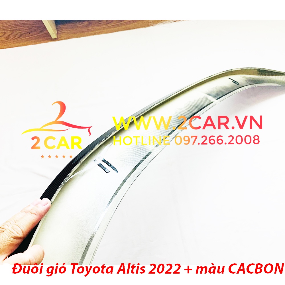 Đuôi gió thể thao, cánh lướt gió Xe Toyota Altis 2022 2023 Sơn Màu CACBON, Tặng kèm keo dính