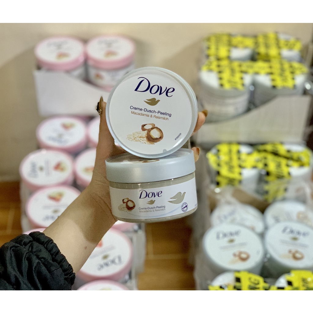 Kem Dove giúp tẩy tế bào chết chăm sóc da chiết xuất bơ hạt mỡ và hạt lựu 298g