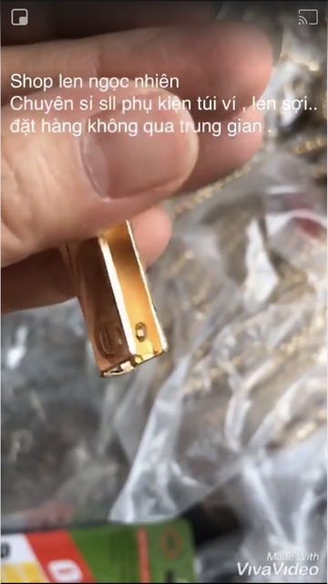 Kẹp cạnh túi chia ngăn hàng đẹp , dày , lớp mạ vàng bóng , bên trong mạ màu vàng sáng .