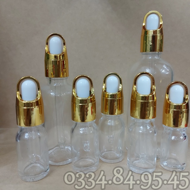 Chai thủy tinh TRONG nắp bóp quai xách vàng, giỏ hoa 5ml 10ml 15ml 20ml 30ml 50ml 100ml - Lọ chiết tinh dầu, đựng serum.