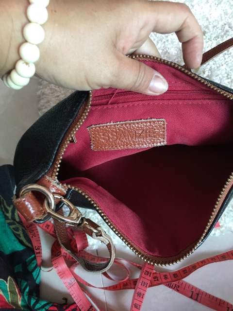 Túi đi da thật hiệu y hình đeo chéo