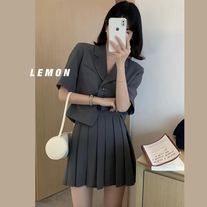 Set Áo Khoác Ngắn Tay Form Rộng + Chân Váy Xếp Ly Thời Trang Nữ