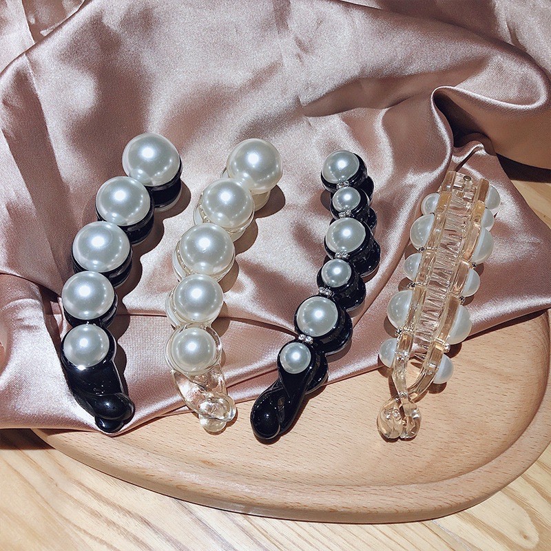 Kẹp tóc đính ngọc loại xoắn