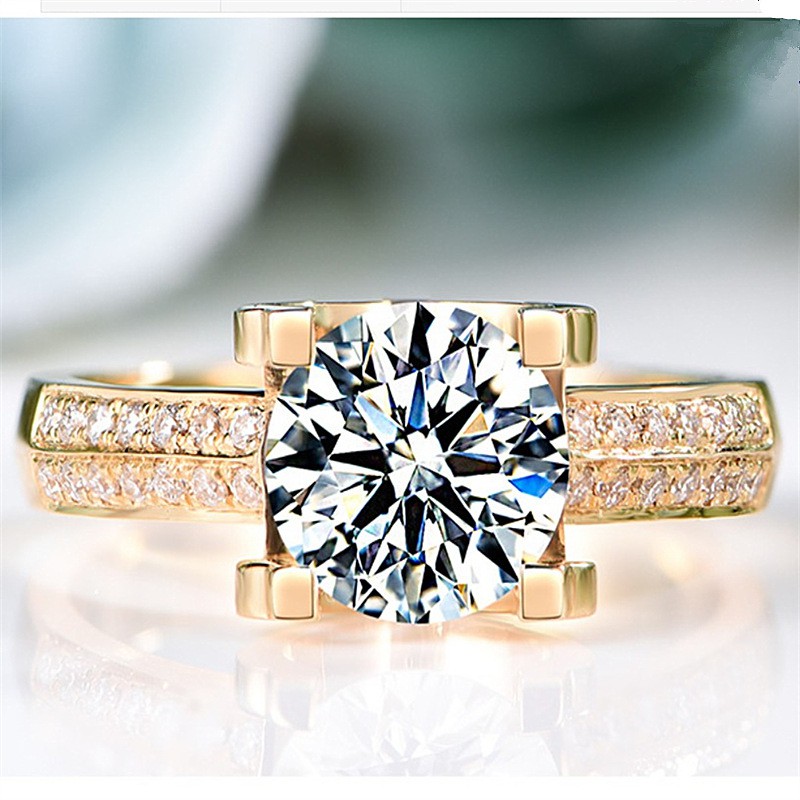 Nhẫn đính hôn kim cương vàng trắng thiết kế sang trọng cho nữ