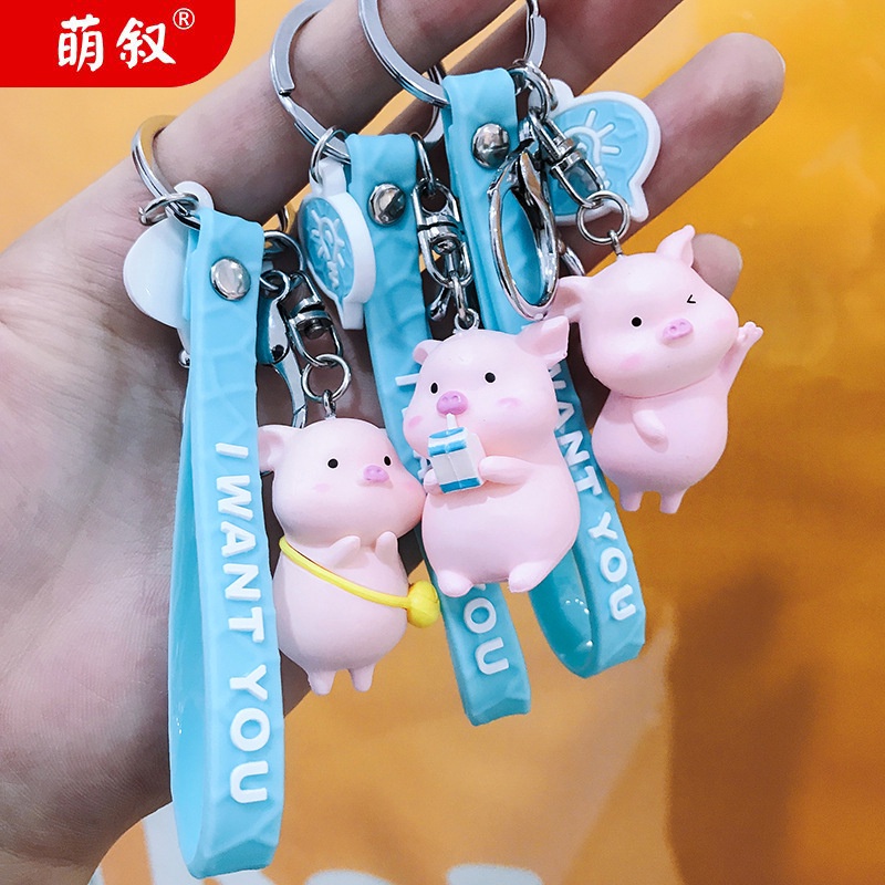 Hoạt Hình Móc Khóa Nhựa Hình Chú Heo Mặc Áo Mưa Dễ Thương