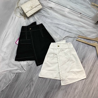 Chân váy đắp chéo phối chỉ nổi